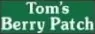 A green banner with the words tom 's bakery parlor